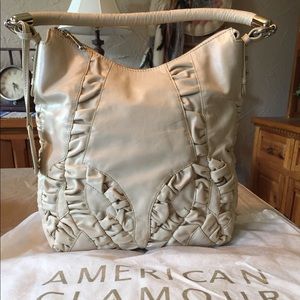 Beautiful leather handbag by Badgley Mischka